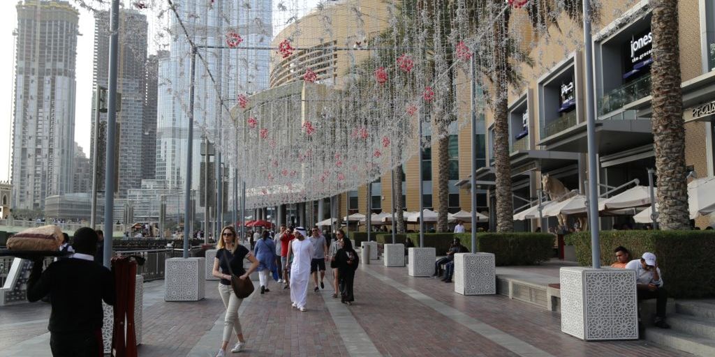 Dubai skyline with expatriates enjoying lifestyle